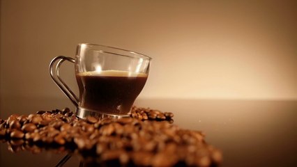 hand-putting-sugar-cup-coffee