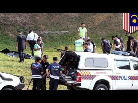 Malaysian police officer shoots knife-wielding robber dead