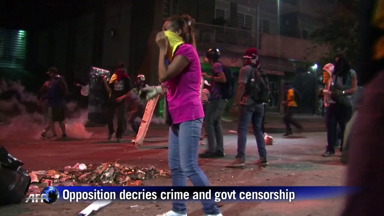 Protesters clash with Venezuelan security force...