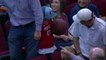 Basket-ball Fan Catches Autographed Ball, Gives It To Kid
