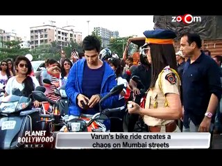 Captured Varun Dhawan riding bike on the streets of Mumbai