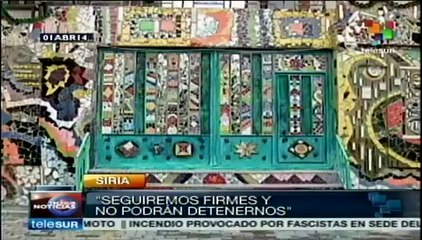 Elaboran mural con restos de casas destruidas por terrorismo en Siria