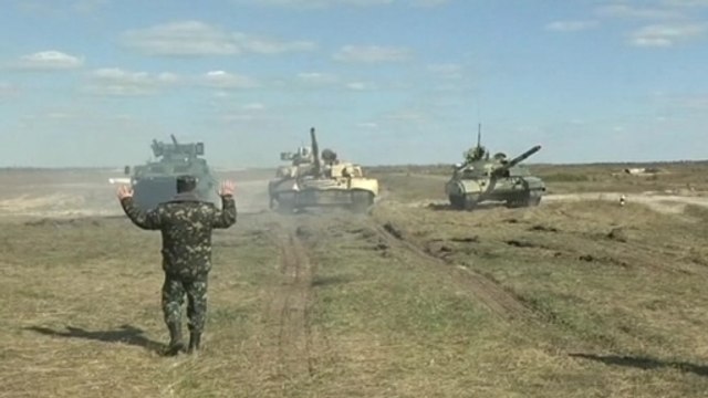 Ukraine's acting president pledges financial support for military