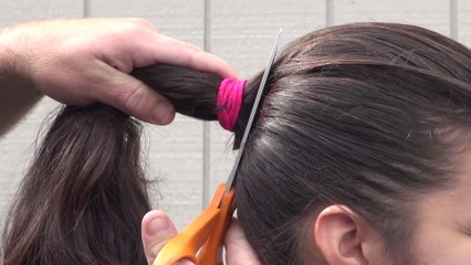big extremely thick ponytail gets chopped off