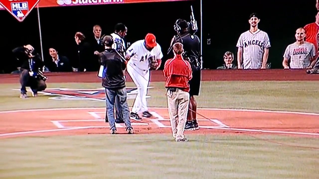 Baseball Angels coach Don Baylor injures leg receiving first pitch from Guerrero