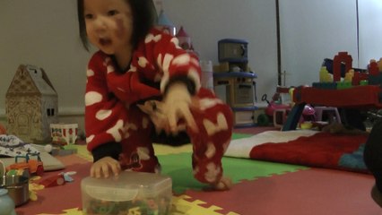 Girl Cleaning Up Her Toy