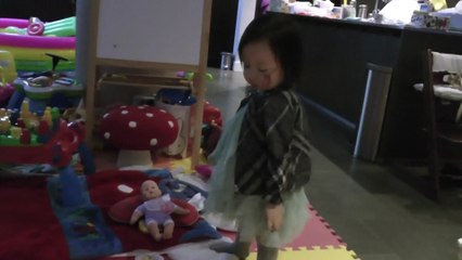 Girl Distributing Toys