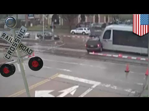 Caught on tape: SUV driver ignores rail crossing, gets a huge dose of reality