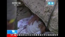 Woman pulled from China building collapse