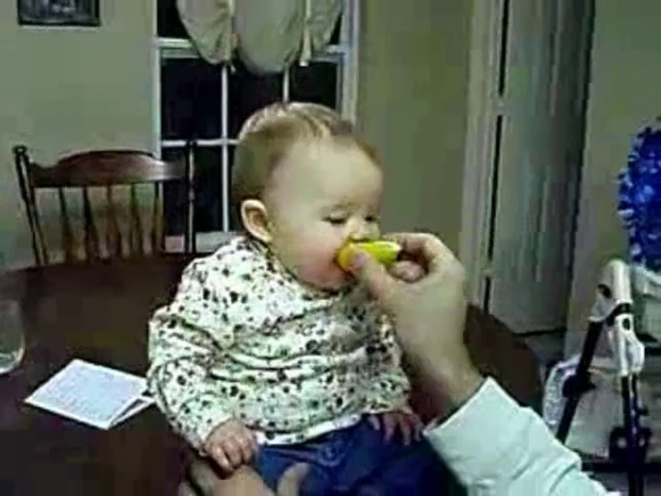 Baby Eats a Sour Lemon