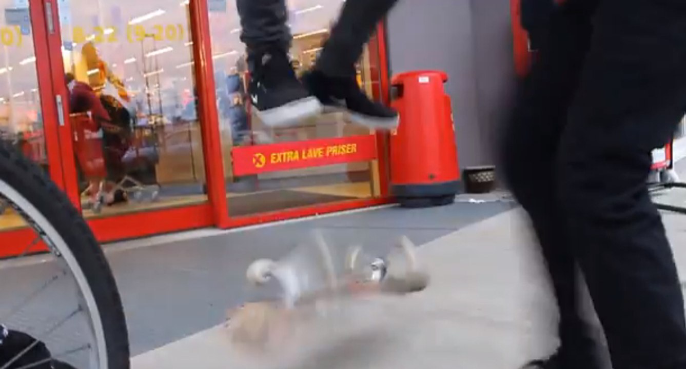Lazy skater gets someone else to flip his board for him