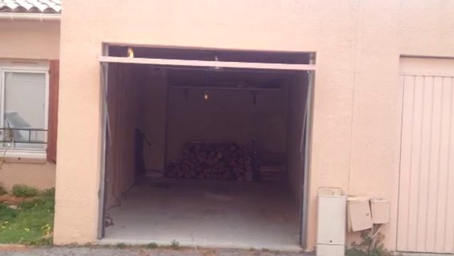 Automatisme de porte de garage basculante posé par APG Accès Porte de Garage