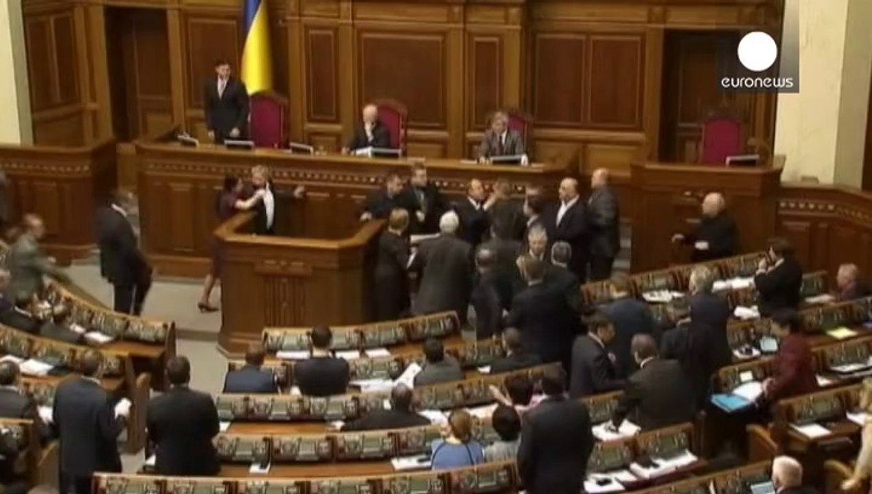 Brawl in Ukraine parliament as tensions rise in east