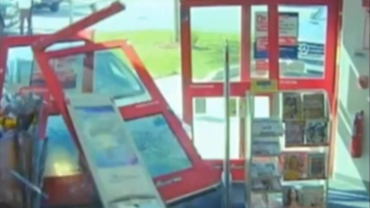 80-year-old cheats death as car smashes through store