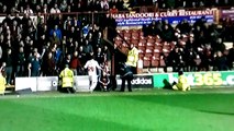 Crawly town player swings a punch at fan