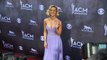 Fashions And Winners On The Red Carpet At The ACM Awards