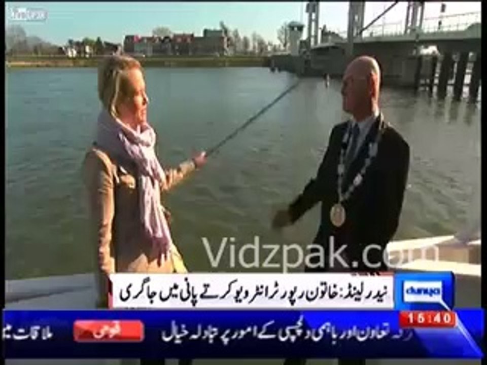 VIRAL VIDEO - Dutch reporter falls into river during interview