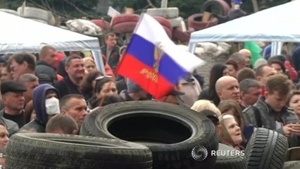 Ukraine in talks with separatists, offers amnesty