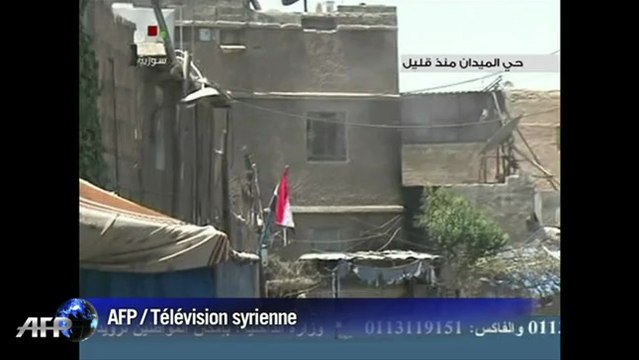 La télévision d'état syrienne montre des combats dans Damas