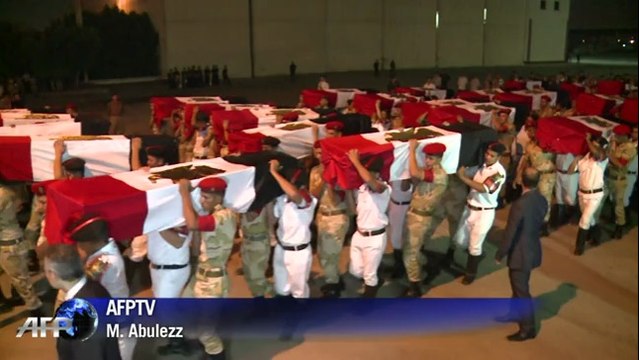 Egypte: funérailles des 25 policiers tués par des