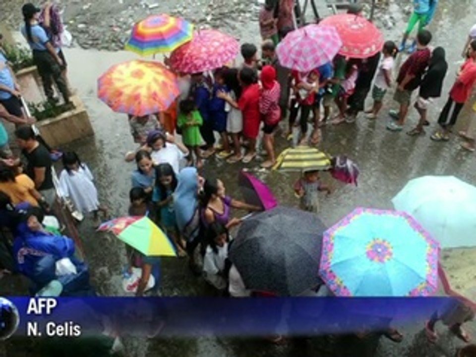 Philippine; grand nettoyage après les inondatio...