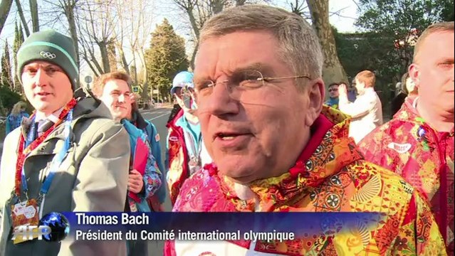 Ban Ki-moon et Thomas Bach en porteurs de la flamme olympique