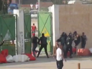 ‫شاهد صور لاول مرة الامن يعتدي على جماهير النجم‬