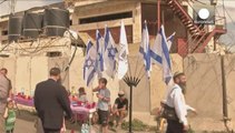 Jewish settlers lay claim to disputed house in Hebron