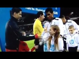 Download Video: Luis Suarez handshake snubbed by 10-year-old girl mascot