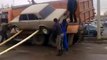How Not To Unload A Car From A Truck!