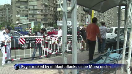 Bomb attack in Cairo wounds 2 police, civilian