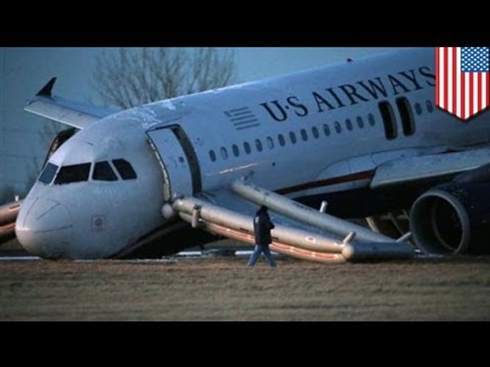 US Airways plane "crashes" at Philadelphia international airport after nose gear collapse