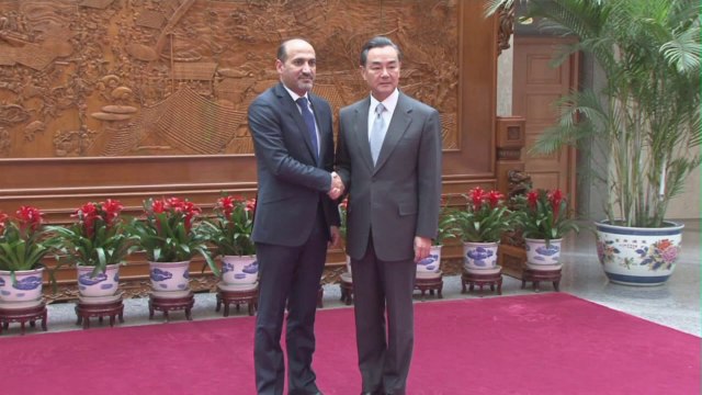 China tells Syrian opposition chief Syria at 'critical moment'