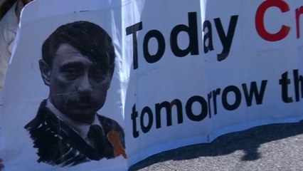 Hundreds protest against Russia outside Geneva meeting