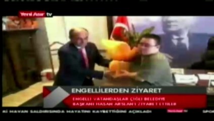 Yeni Asır Tv'de yayınlanan''Engellilere hizmet asli görevimiz''haberi.