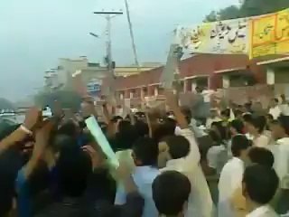 Shoes and abuses for Khawaja Asif