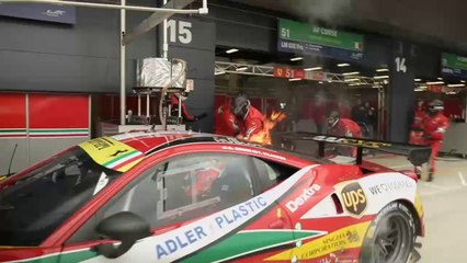 Ferrari on fire on the pitlane