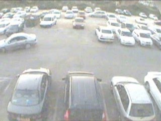 Woman at parking place