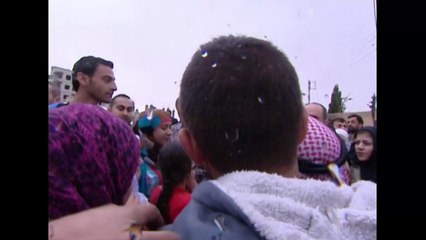 Syria's Assad pays Easter visit to old Christian town