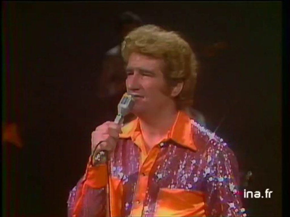 Eddy Mitchell "Un sourire ou un au revoir"