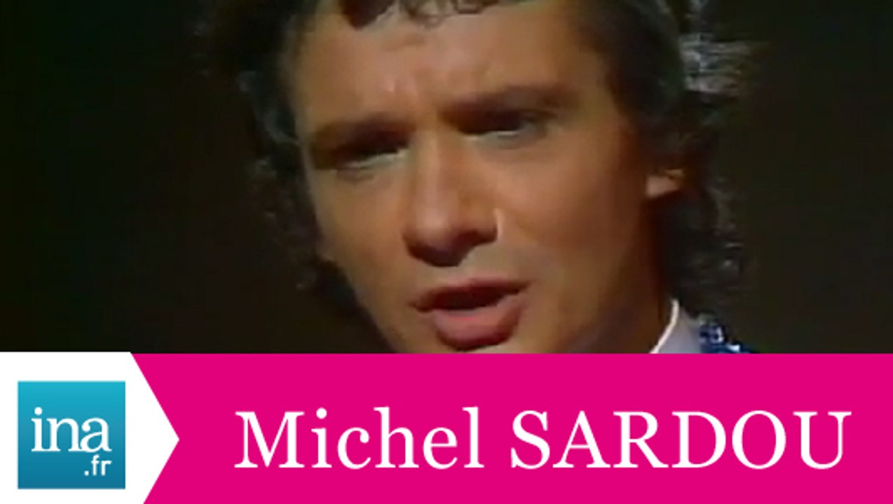 Michel Sardou "En chantant" (live officiel) - Archive INA