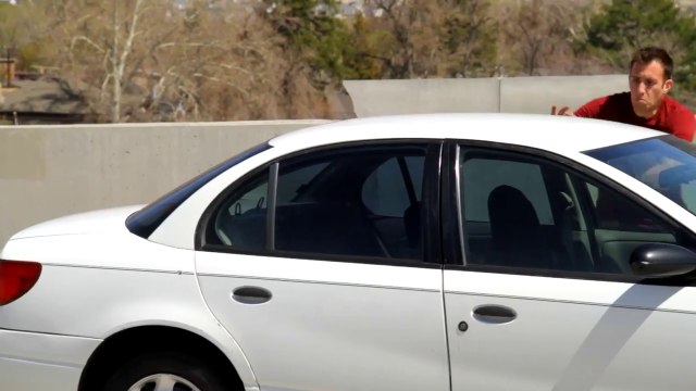 Street performer doing Car Parkour