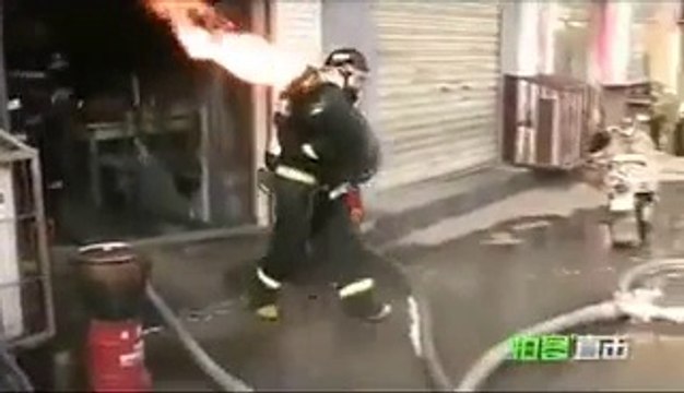 Fire Fighter with gas cylinder on fire... Just crazy!