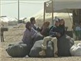 آلاف اللاجئين السوريين يطالبون بحق اللجوء
