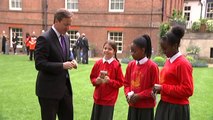 PM plants poppies with school children at Downing Street