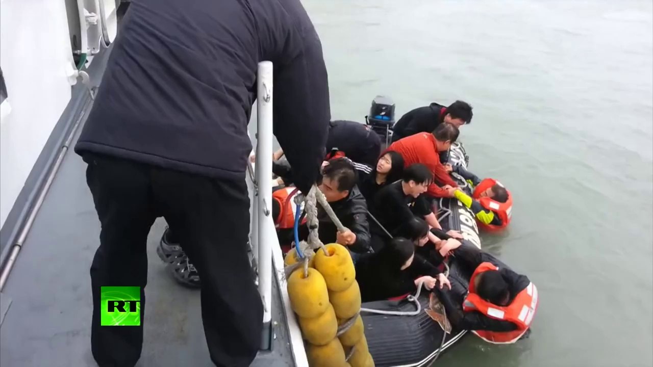 Sewol ferry captain flees as ship sinks with hundreds trapped inside