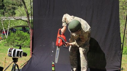 Crazy guy Opening Cider and Coke with a Chainsaw in Slow Motion