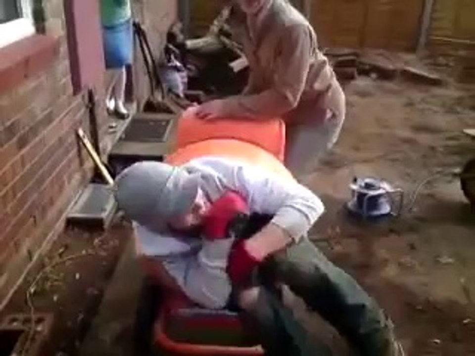 Man in cement mixer