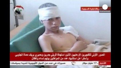 Syria: twin car bombs kill at least 18