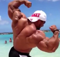 Roelly Winklaar Flexing on the Beach in Curaçao